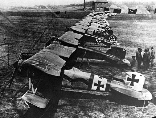 German Albatros D.IIIs of Jagdstaffel 11 parked in a line, Richthofen's red aircraft second from the left